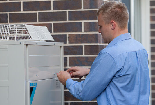 Man fixing a machine