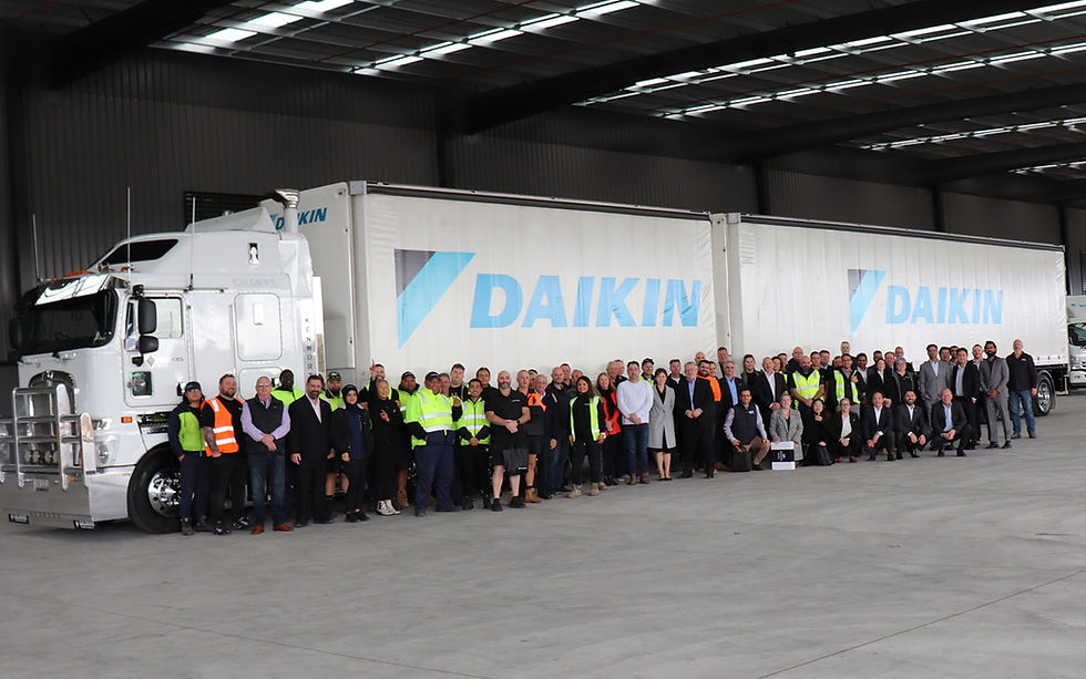 Image 5: Guests gathered in front of a Daikin B-Double during the opening of Daikin Park Melbourne this week.